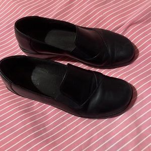 Clarks black slip on shoes